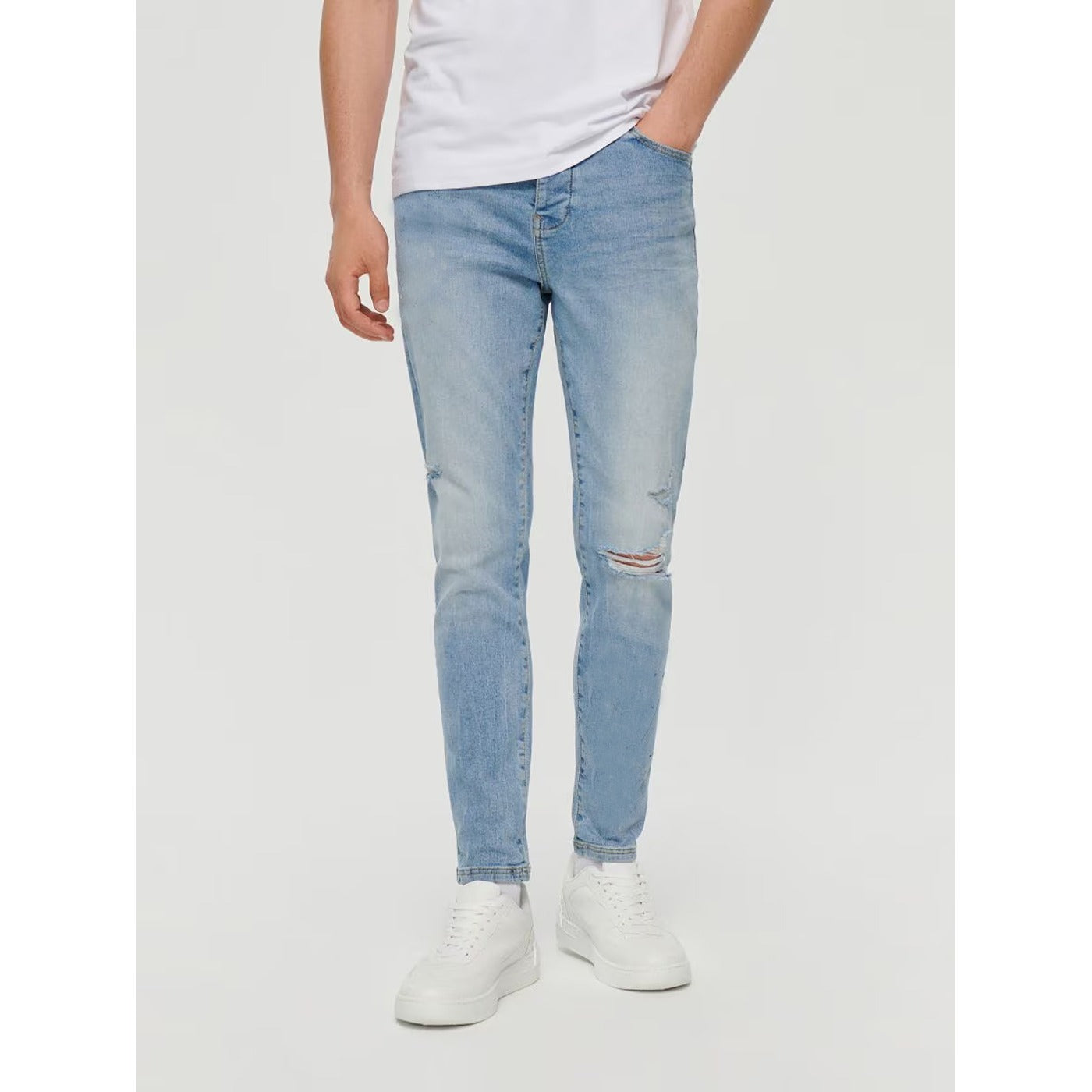 Light Blue Skinny Fit Ripped Jeans | Montivo Pakistan