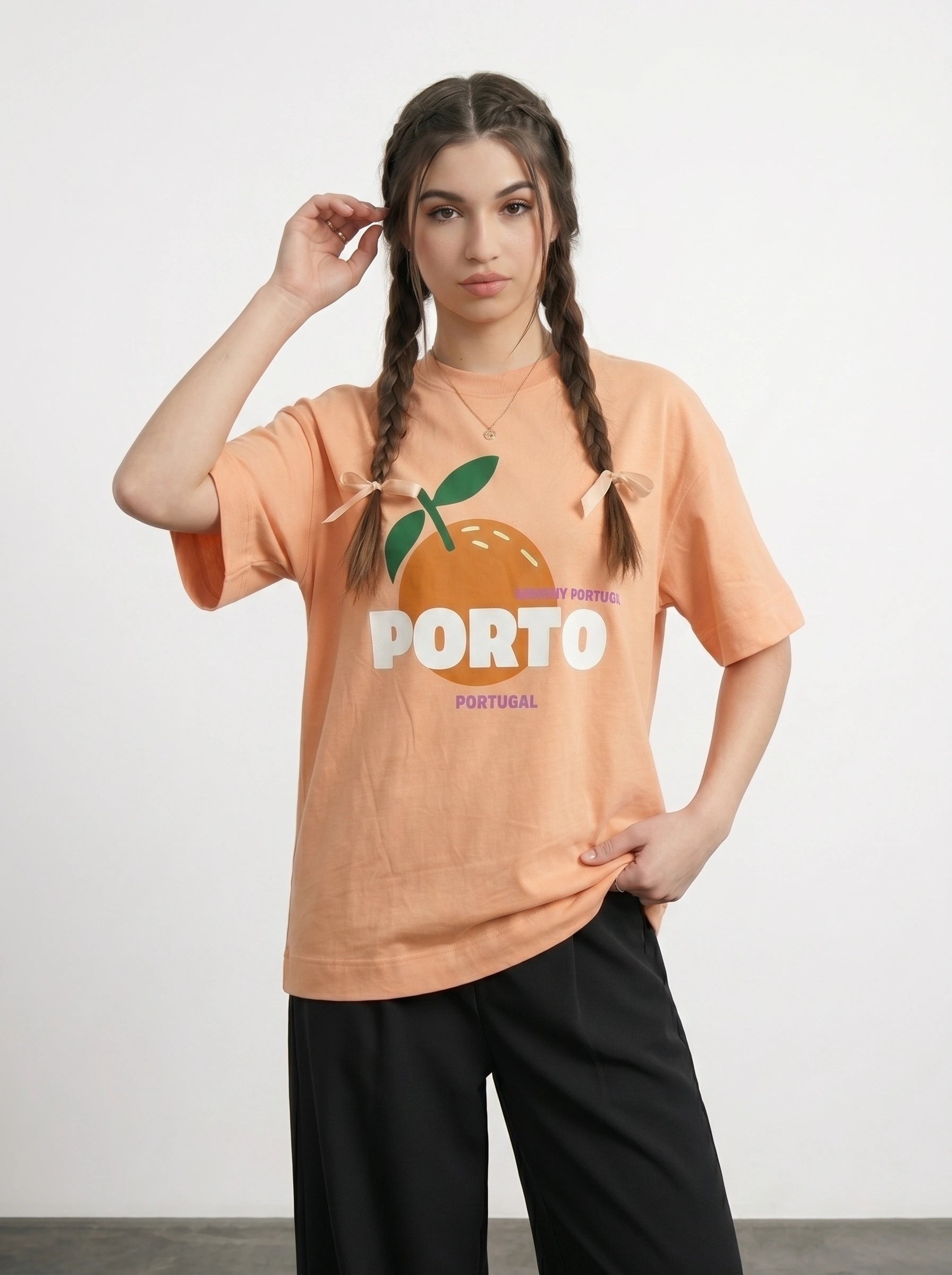 Peach Porto Oversized Graphic Printed Tshirt | Montivo Pakistan