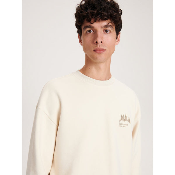 Cream Embroidery Detailing Sweatshirt | Montivo Pakistan