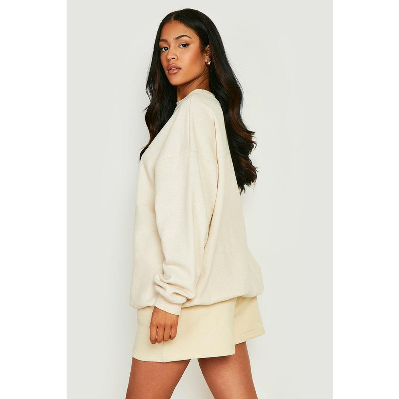 DSGN STUDIO Logo Cream Sweatshirt | Montivo Pakistan