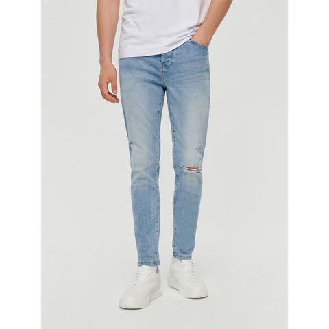 Light Blue Skinny Fit Ripped Jeans | Montivo Pakistan