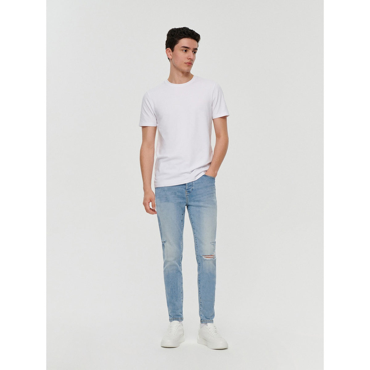 Light Blue Skinny Fit Ripped Jeans | Montivo Pakistan