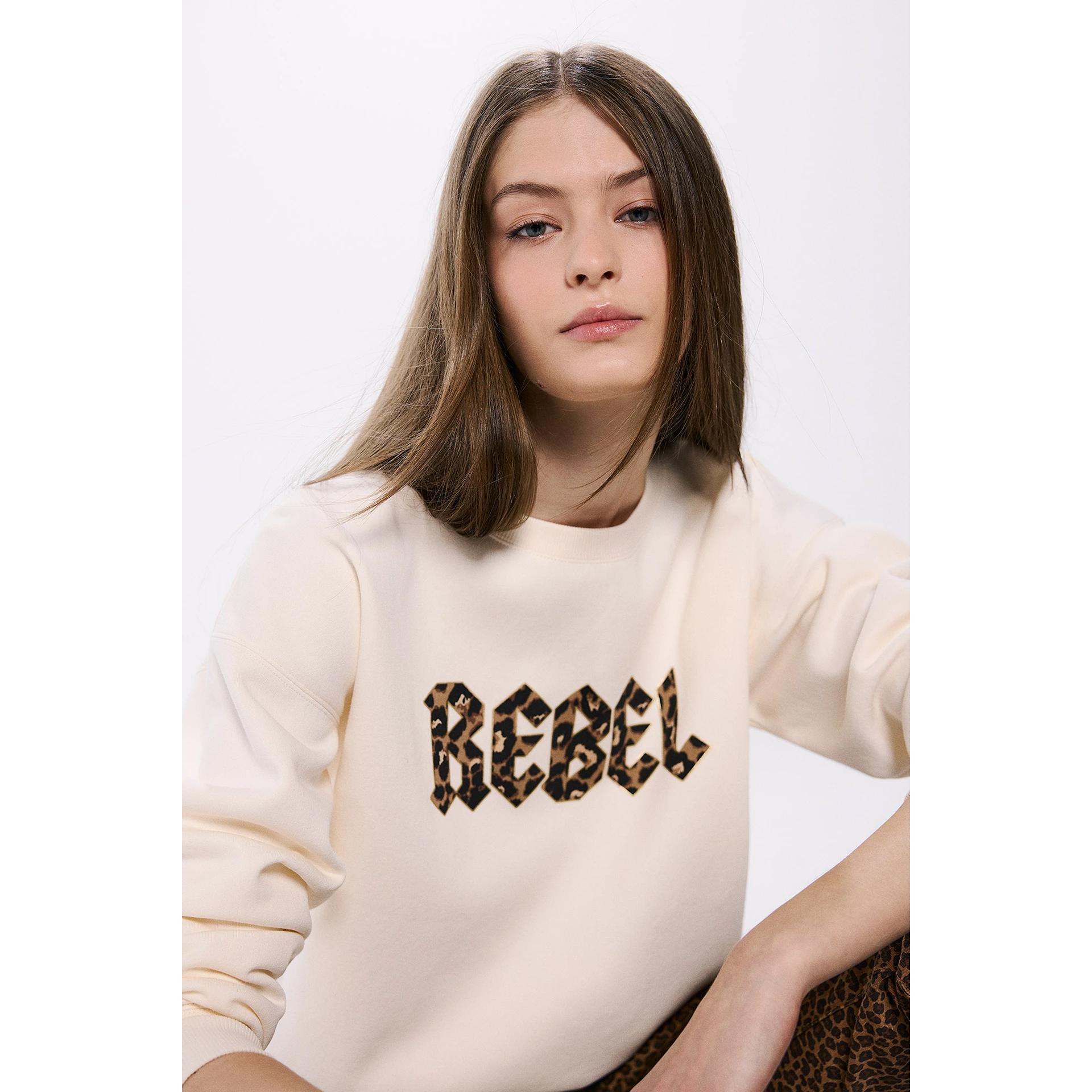 Rebel Off-White Oversized Sweatshirt | Montivo Pakistan
