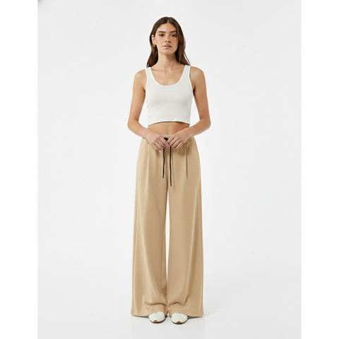 Beige Pleated Wide Leg Trousers | Montivo Pakistan