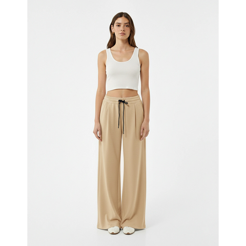 Beige Pleated Wide Leg Trousers | Montivo Pakistan