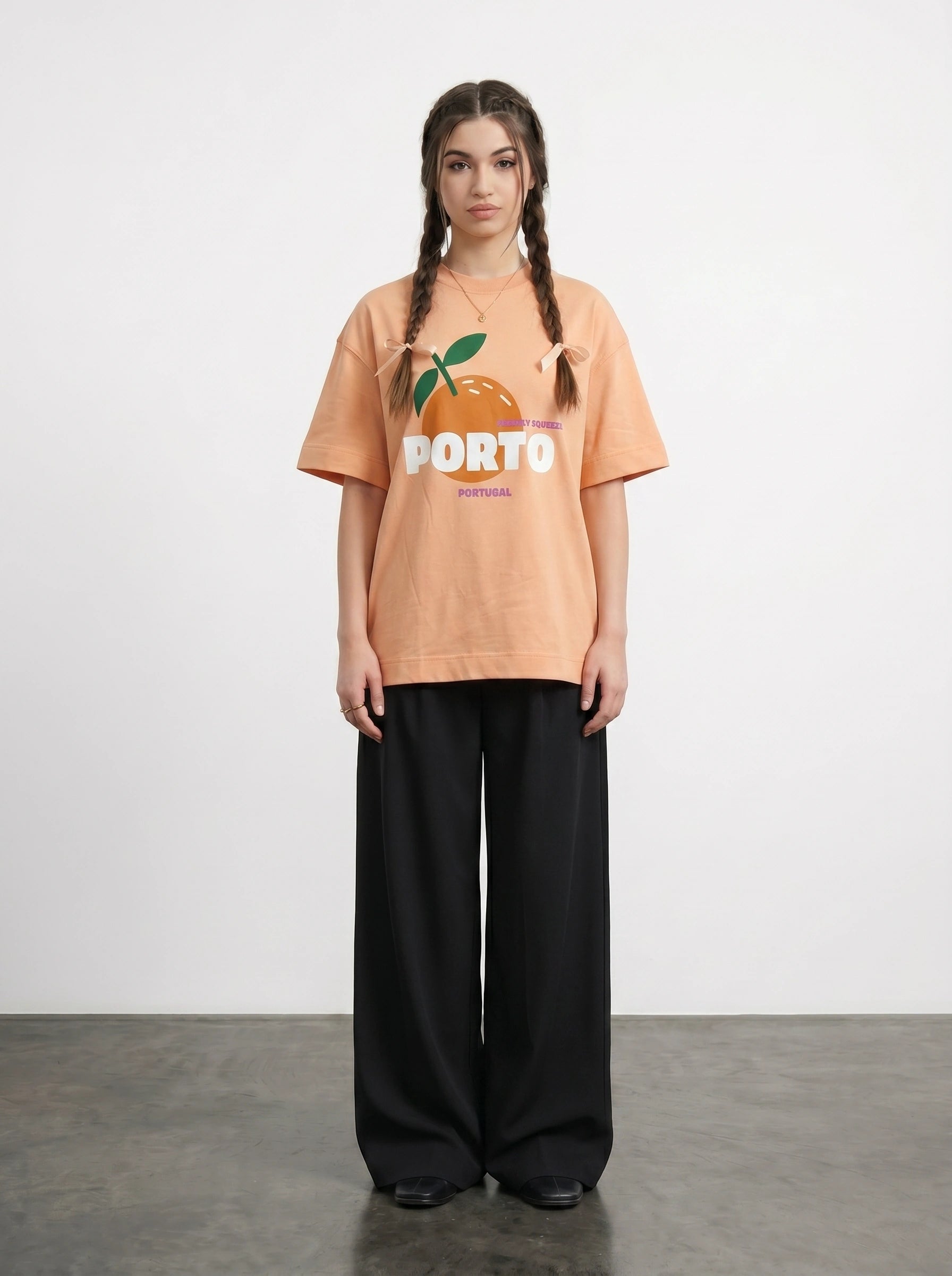 Peach Porto Oversized Graphic Printed Tshirt | Montivo Pakistan