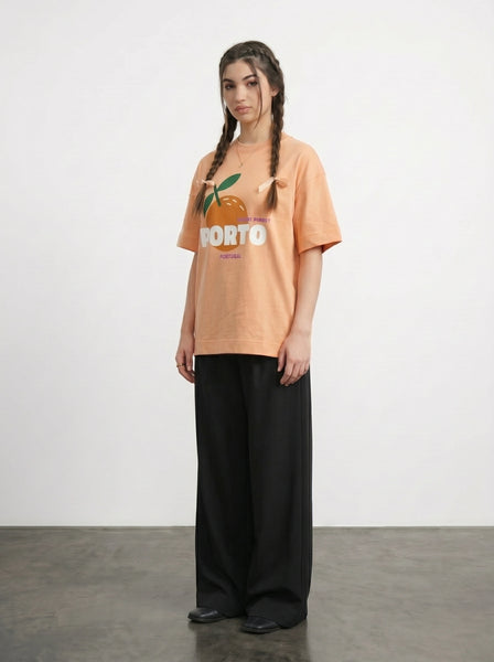 Peach Porto Oversized Graphic Printed Tshirt | Montivo Pakistan
