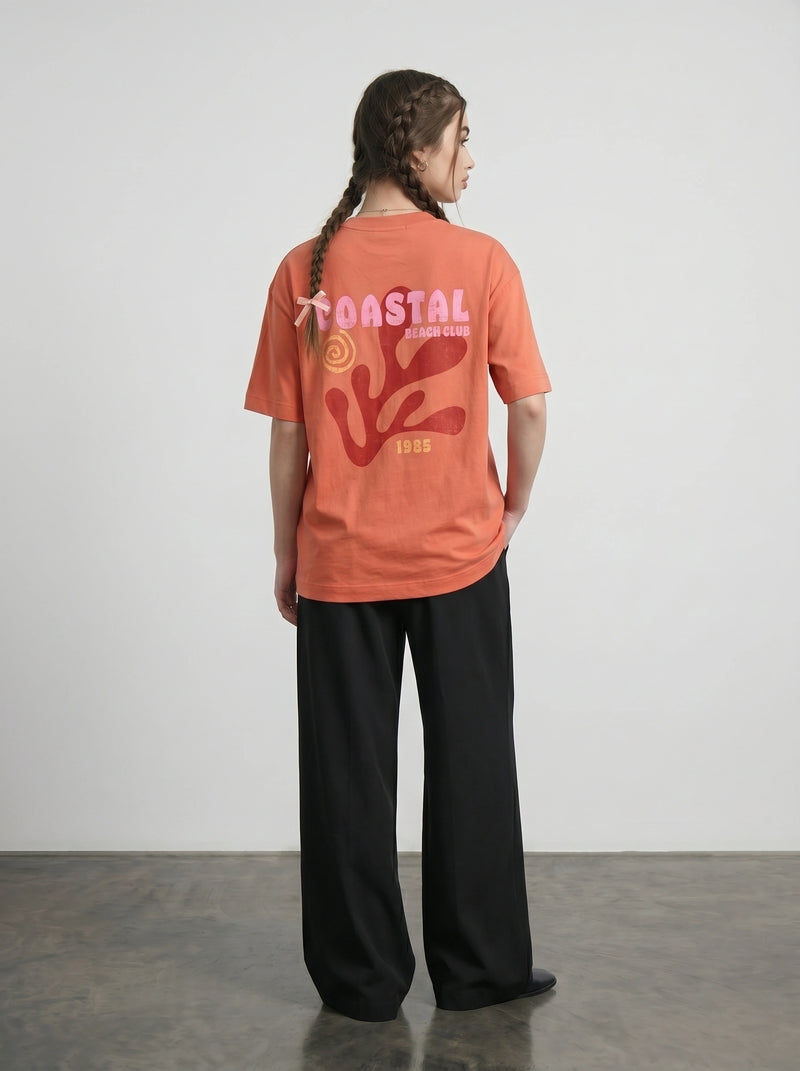 Orange Beach Club Oversized Graphic Printed Tshirt | Montivo Pakistan
