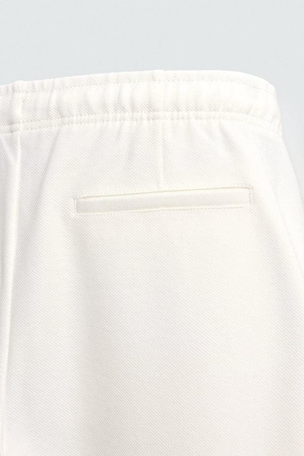 White Textured Slim Fit Trousers