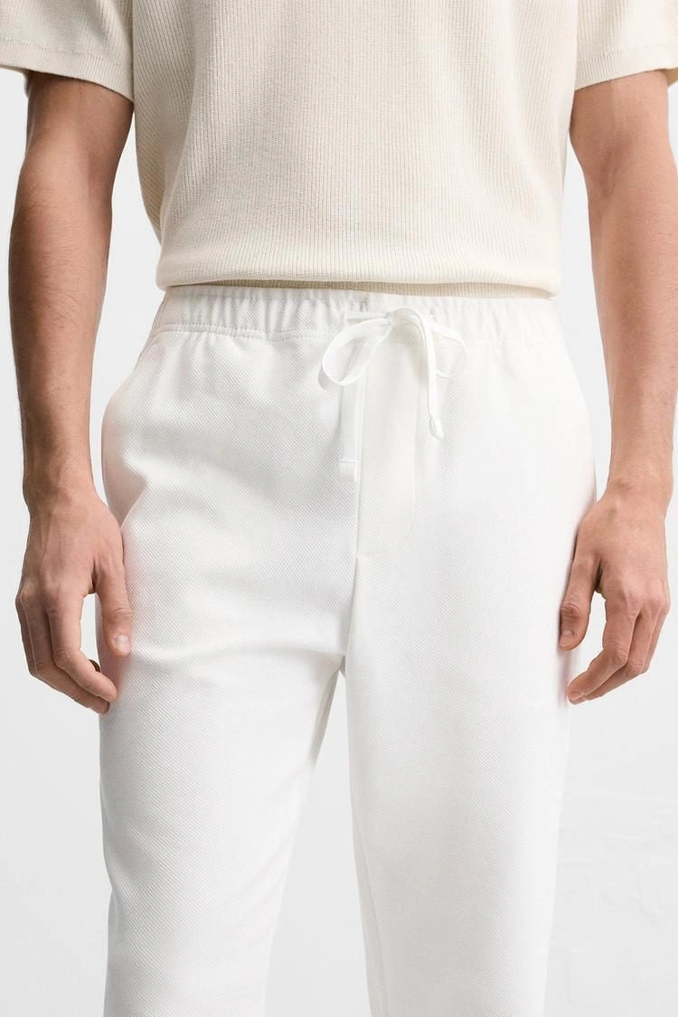 White Textured Slim Fit Trousers
