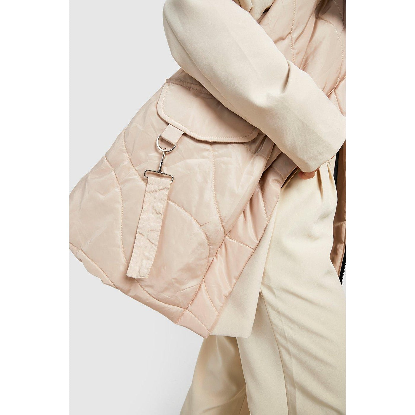 Nude Quilted Funnel Neck Jacket | Montivo Pakistan